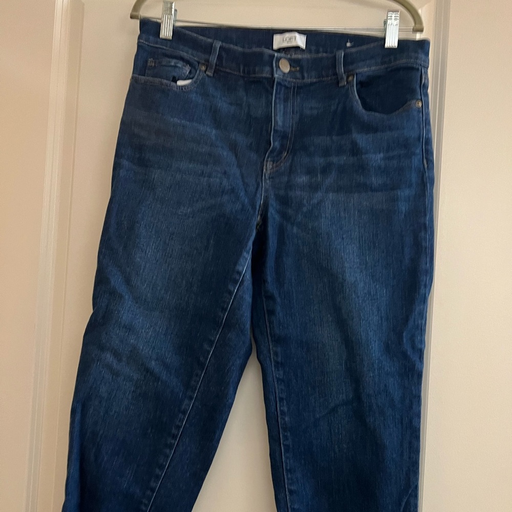 dark wash boyfriend jeans with fray at bottom